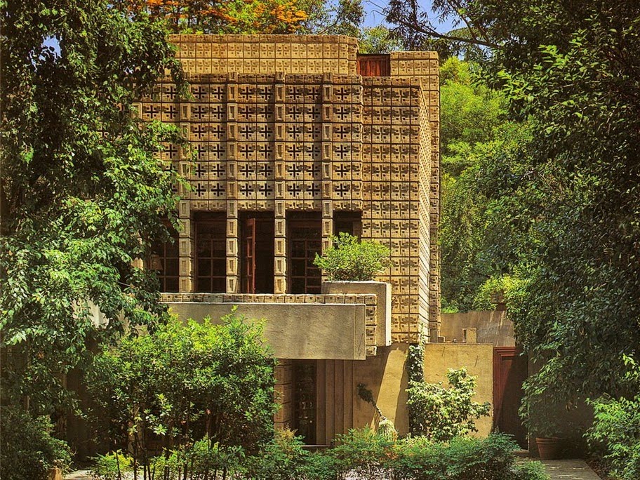  The two eucalyptus trees are still there, forming a cathedral more than 100 feet high over a lily pond in the gully. As he envisioned it, “Balconies and retraces would lead down to the ravine from the front of the house.”